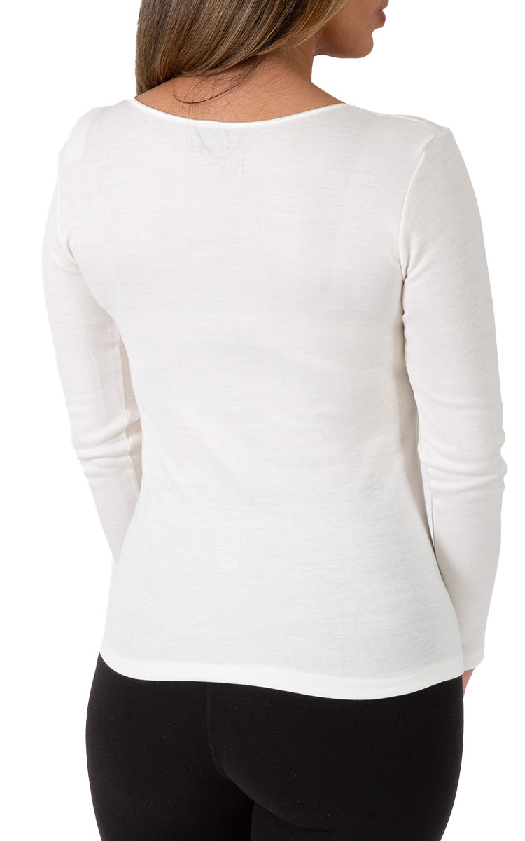 Woman wearing emmebivi cotton long sleeve shirt with lace neckline