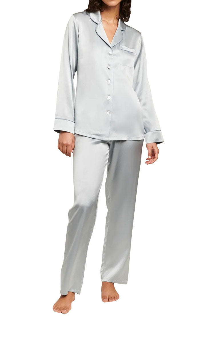 Woman wearing ginia silk pyjama in pearl blue