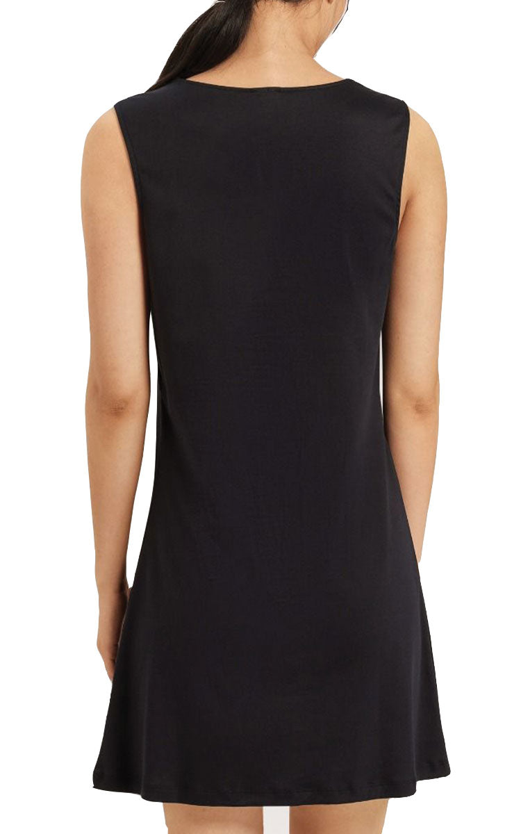 woman wearing hanro sleeveless black nightgown moments