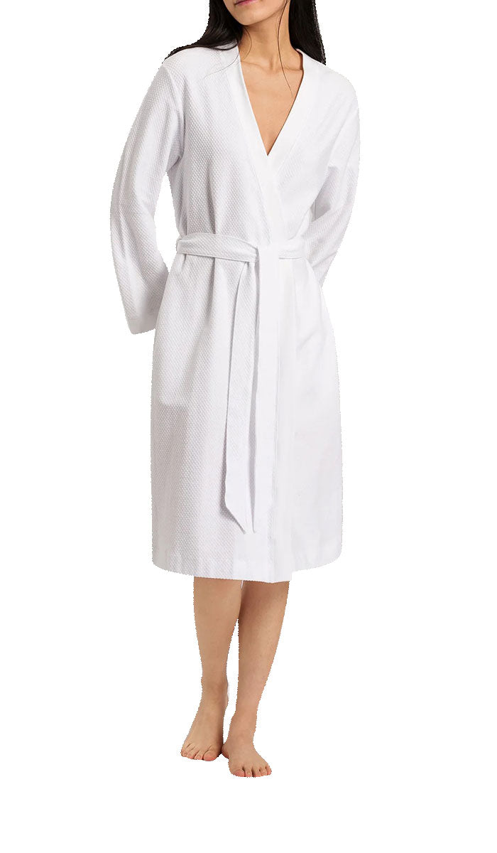 woman wearing hanro robe in white