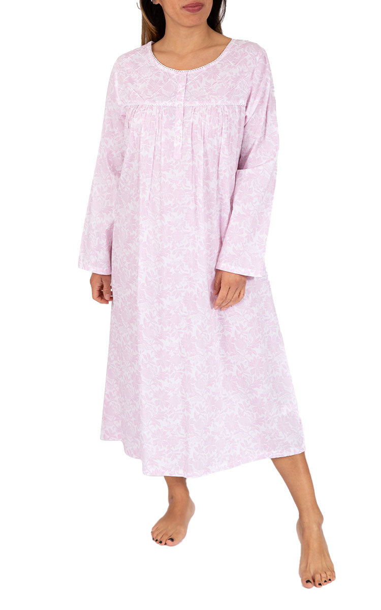 Woman wearing cotton nightie in pink with flowers from french country Australia