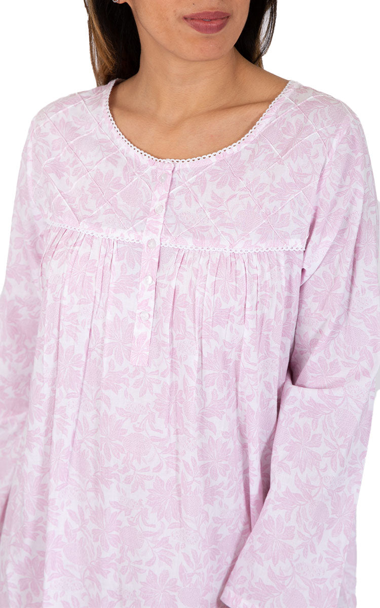 Woman wearing cotton nightie in pink with flowers from french country Australia