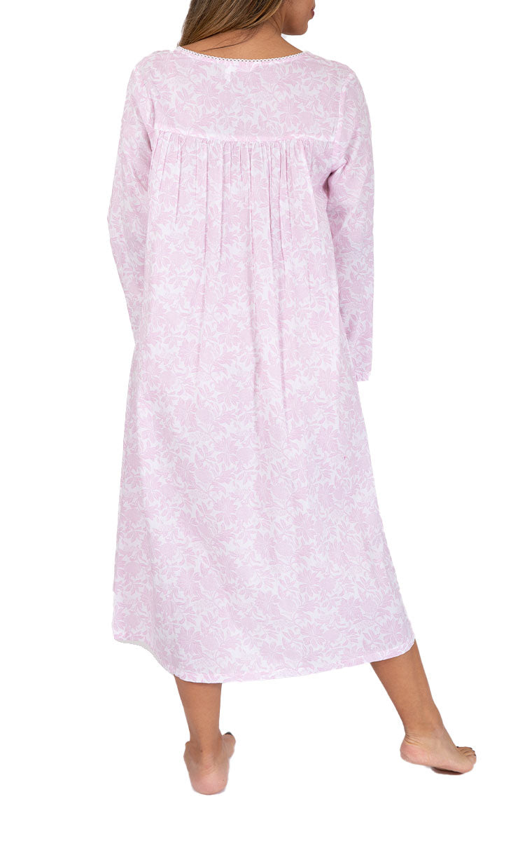 Woman wearing cotton nightie in pink with flowers from french country Australia