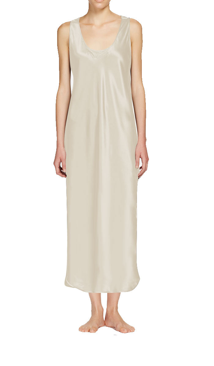 Woman wearing ginia silk nightdress in ivory