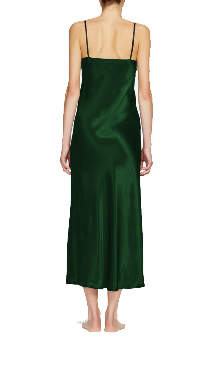 Woman wearing ginia silk nightdress in emerald
