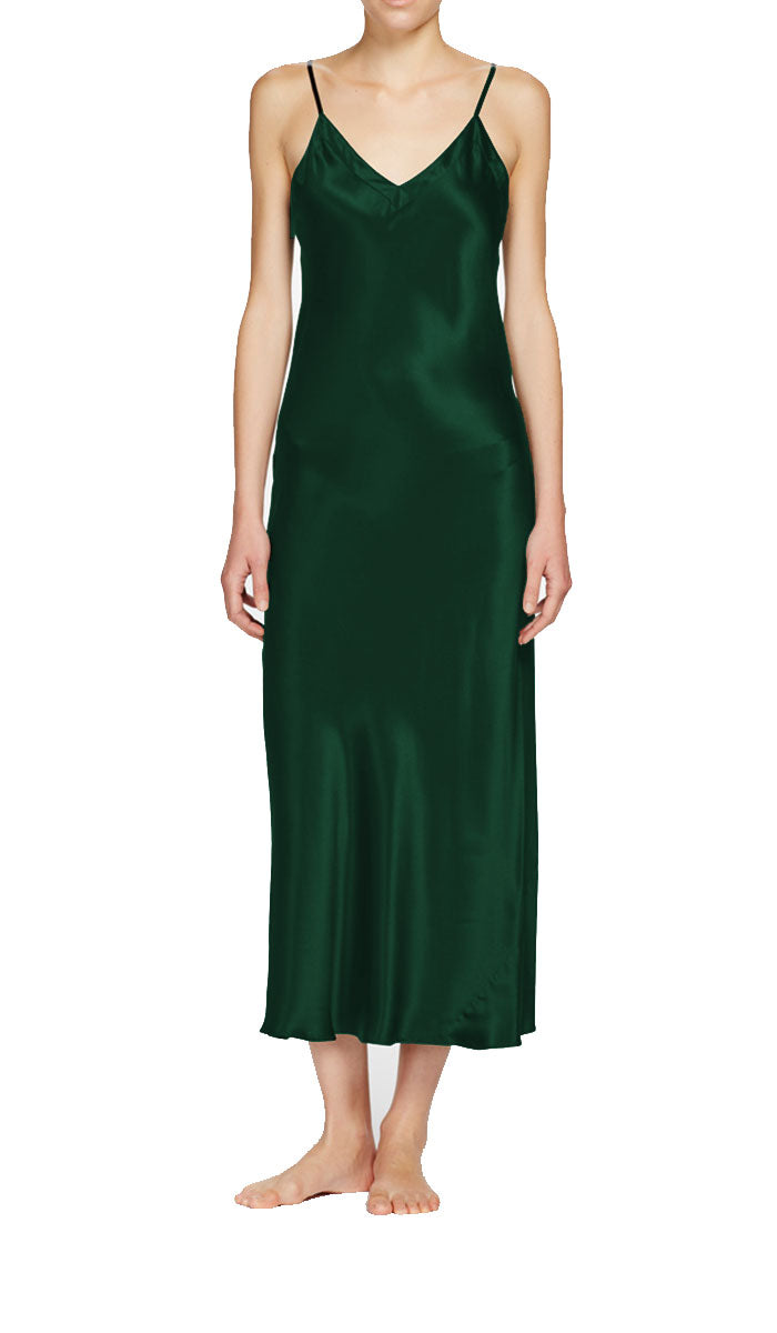 Woman wearing ginia silk nightdress in emerald