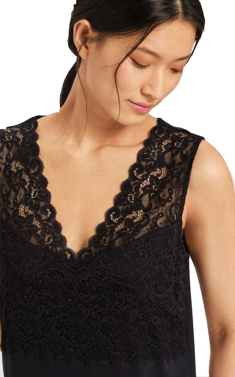 woman wearing hanro sleeveless black nightgown moments
