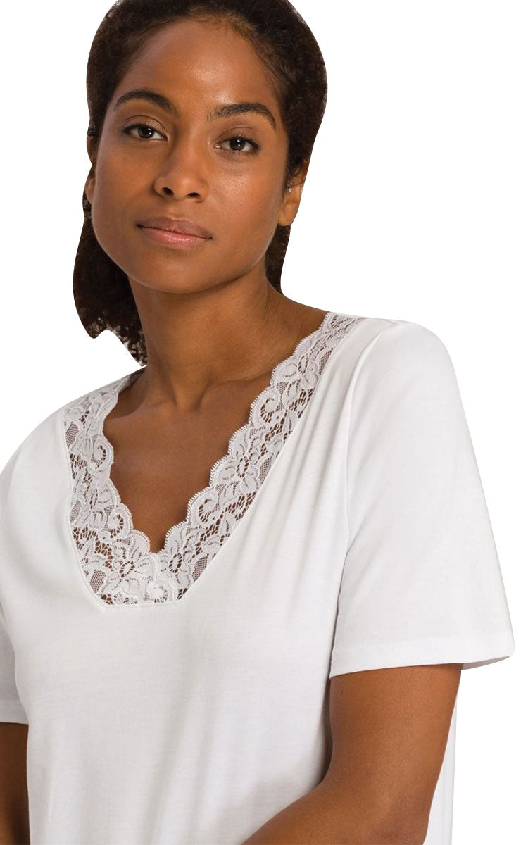 woman wearing hanro cotton nightgown with short sleeve in white