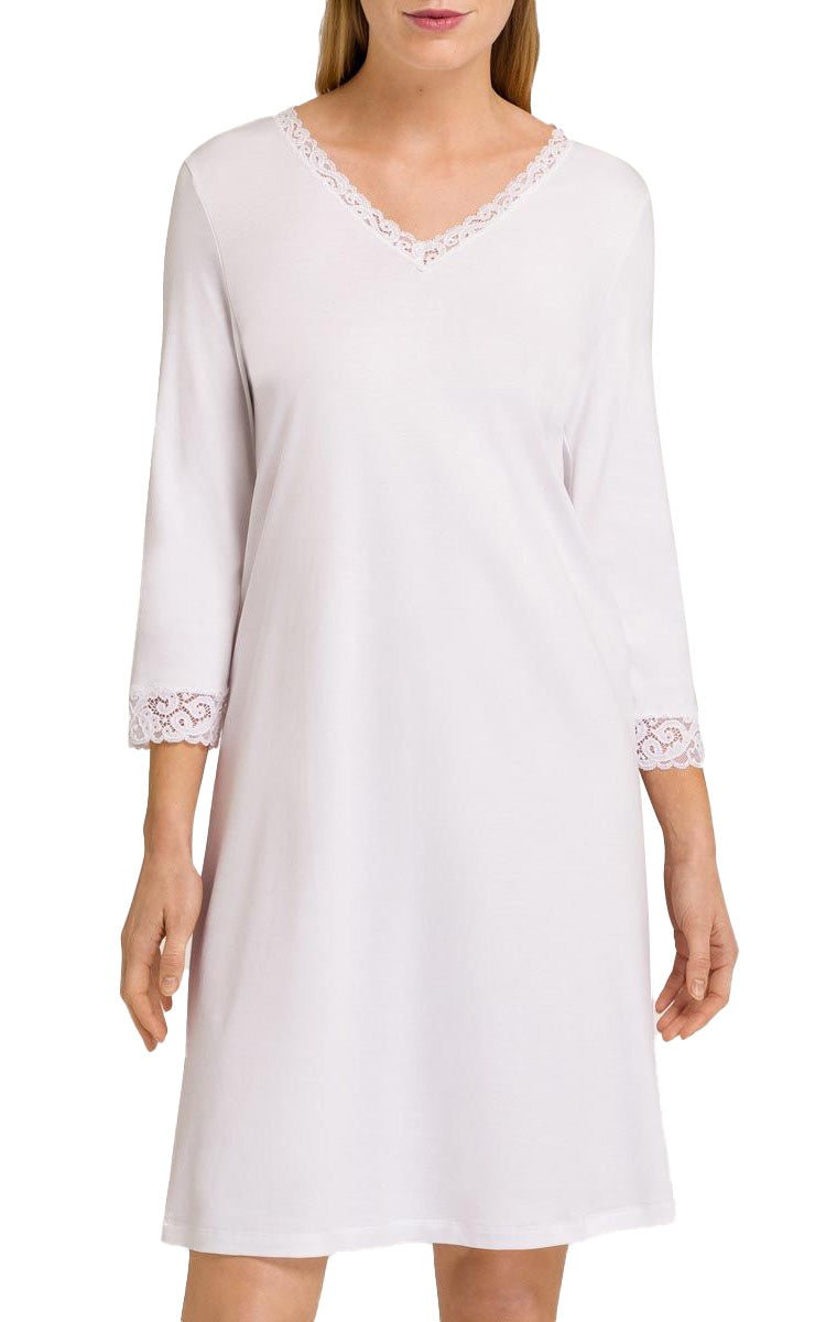 Woman wearing hanro moments 3 quarter sleeve nightie in white