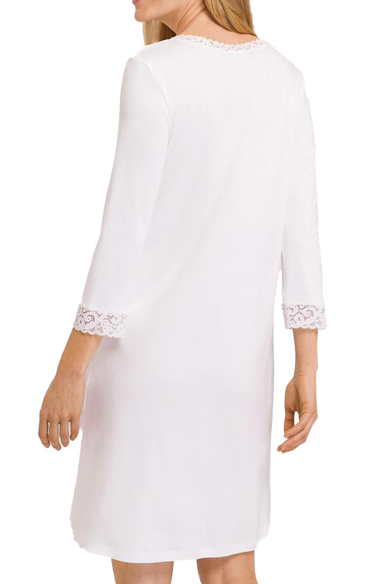 Woman wearing hanro moments 3 quarter sleeve nightie in white
