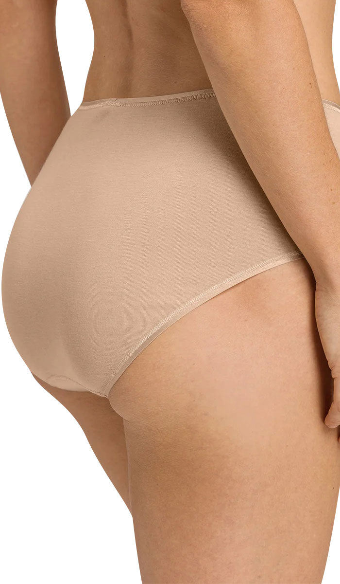 woman wearing Hanro Cotton full brief seamless underwear in beige