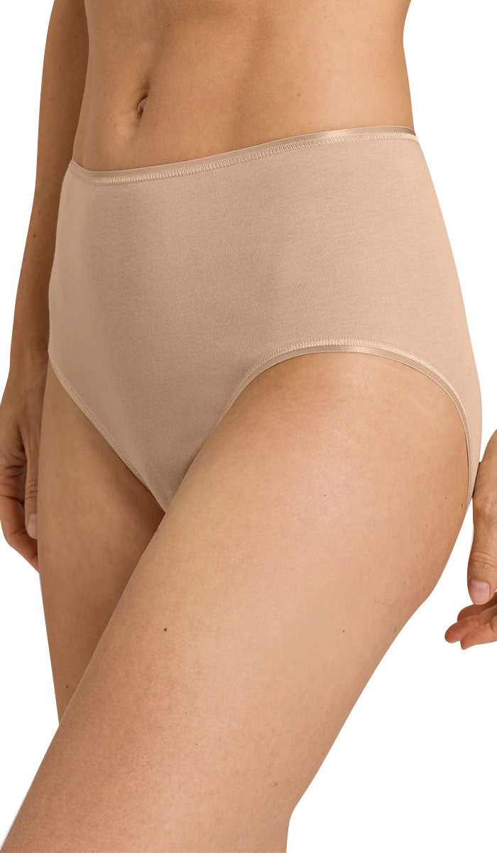 woman wearing Hanro Cotton full brief seamless underwear in beige