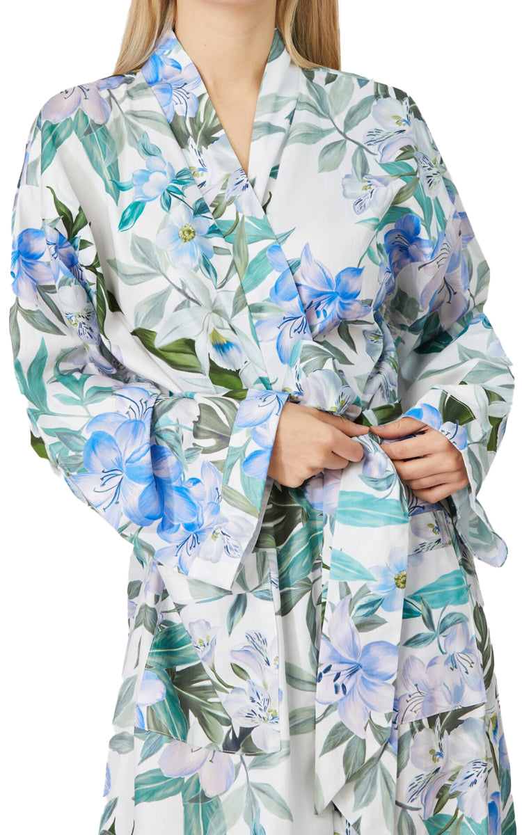 Woman wearing long cotton robe with blue floral print australia