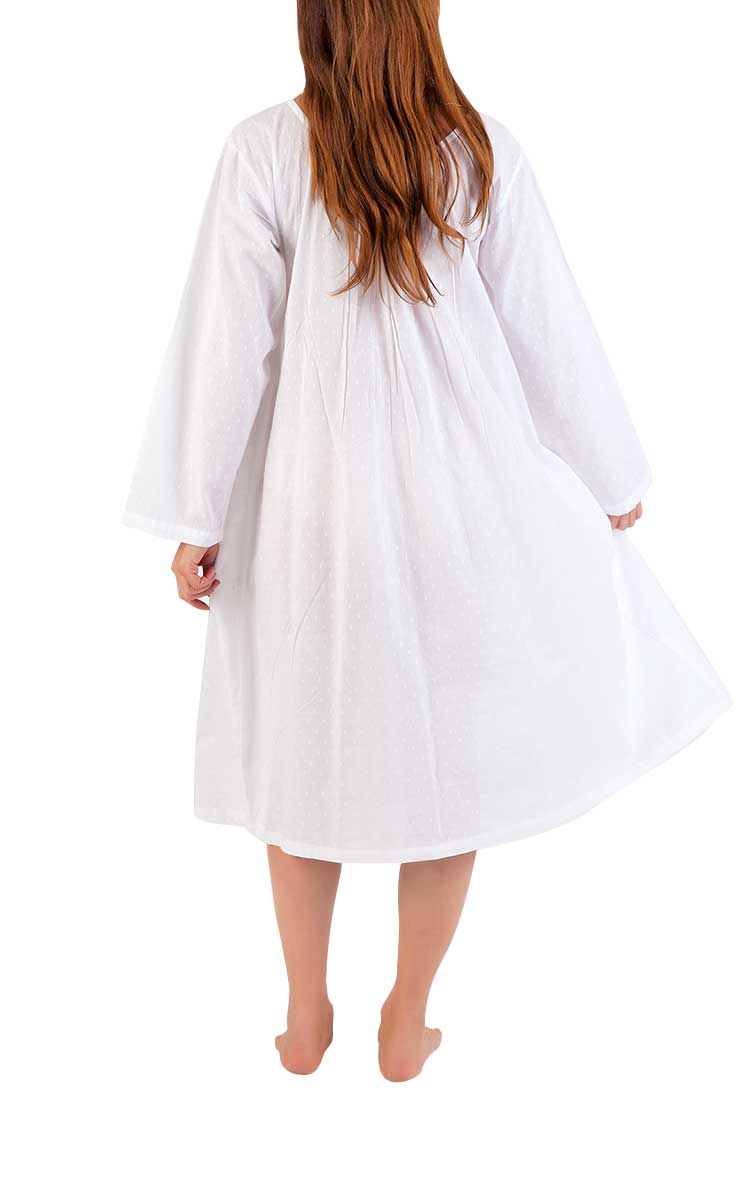 Woman wearing Arabella cotton long sleeve winter nightie in white