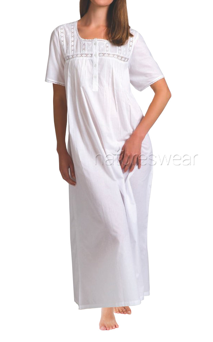 Woman wearing Arabella cotton nightgown in white