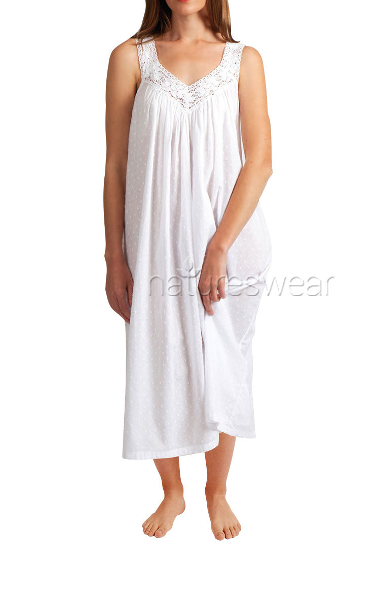Woman wearing white Arabella cotton nightie