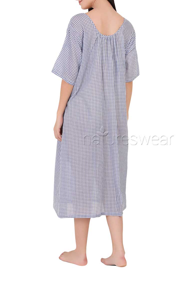 Woman wearing Arabella cotton sundress in gingham print