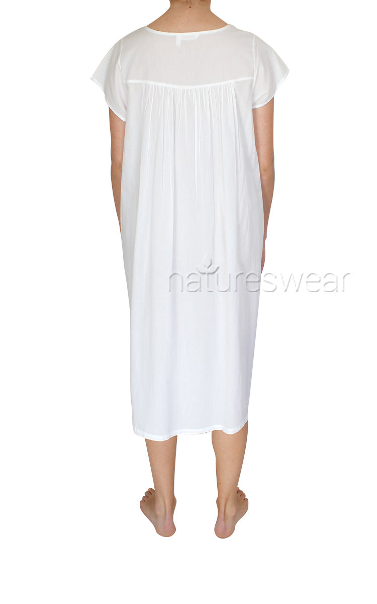 woman wearing French country cotton sleepwear