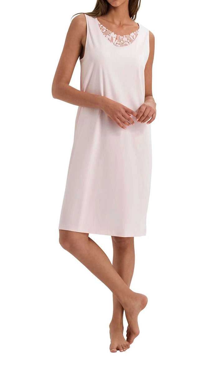woman wearing hanro summer nightgown in pink