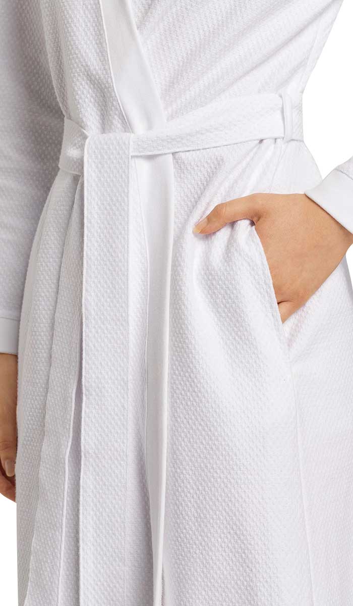 woman wearing hanro robe in white
