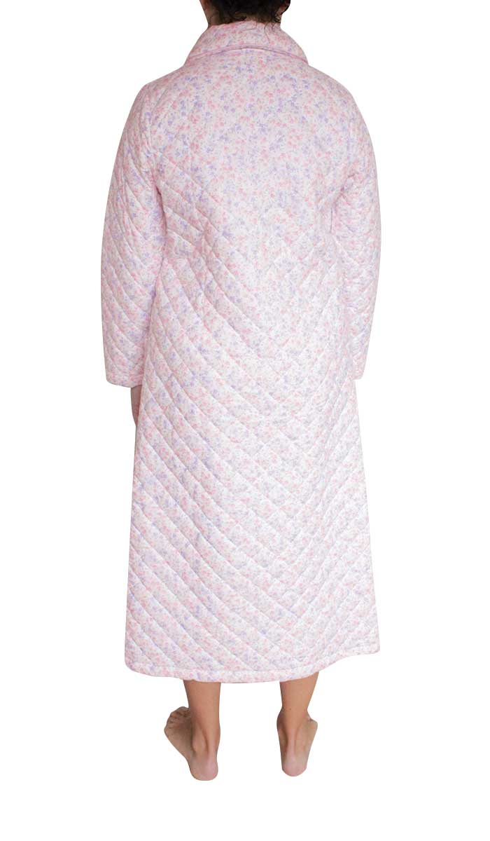 Woman wearing Schrank quilted robe pink 1