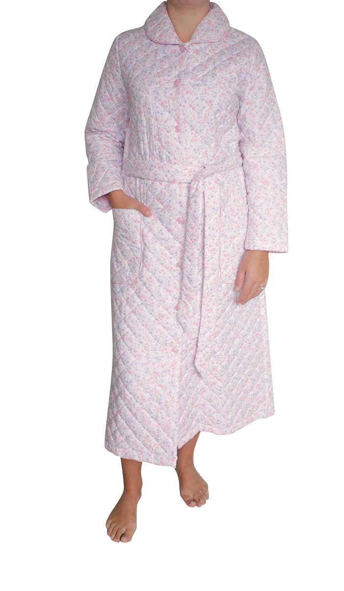 Woman wearing Schrank quilted cotton robe pink 1